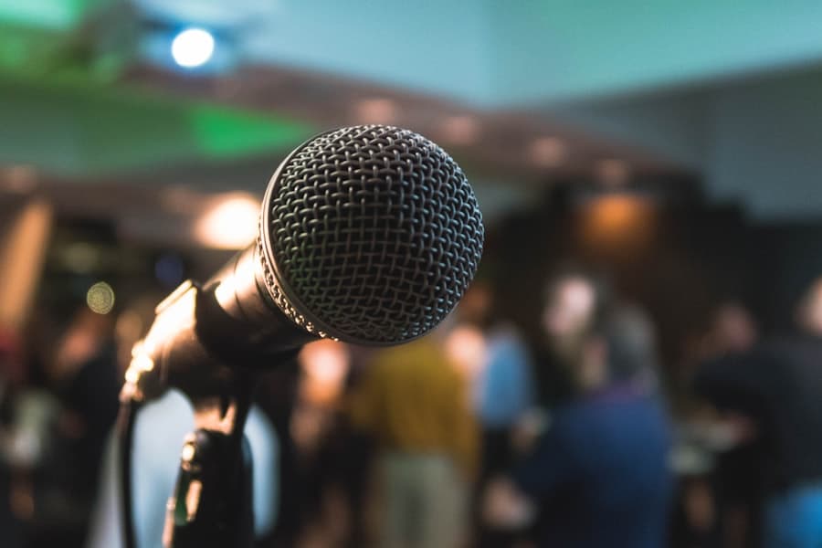 A microphone in front of an audience